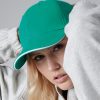 Embroidery and printing on custom athleisure 6-panel cap for sportswear and casual fashion.