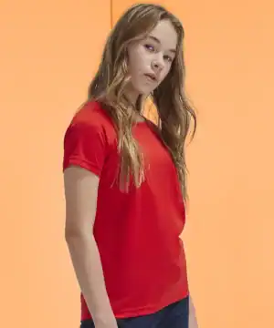Child wearing a red B&C Active T-shirt, casual sportswear for kids.
