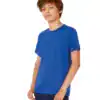 Child wearing a plain blue T-shirt, ideal for custom embroidery and printing.