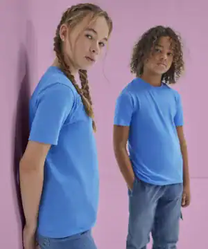 Two kids wearing blue T-shirts, suitable for embroidery and printing, against a pink background.