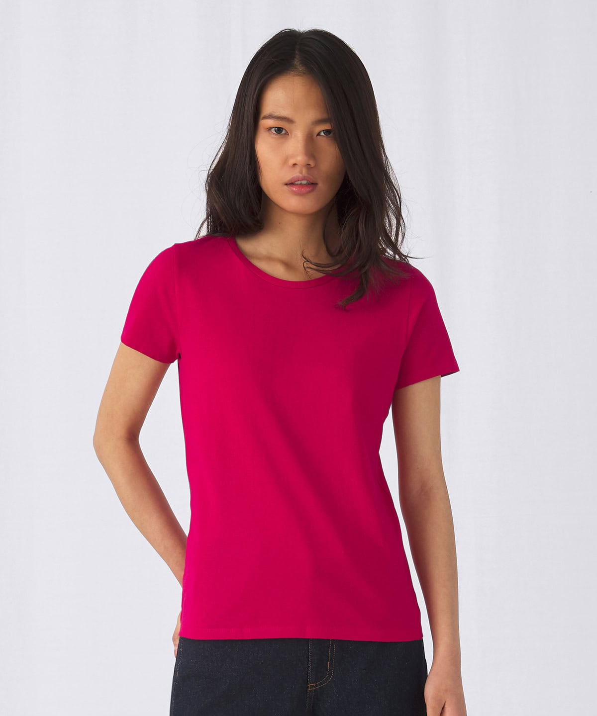 Women’s embroidered T-shirt with vibrant pink colour, perfect for casual or promotional wear.