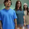 Group of three models wearing colourful embroidered T-shirts for casual fashion.