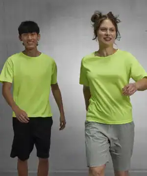 Two people wearing neon yellow active T-shirts for sports and fitness.