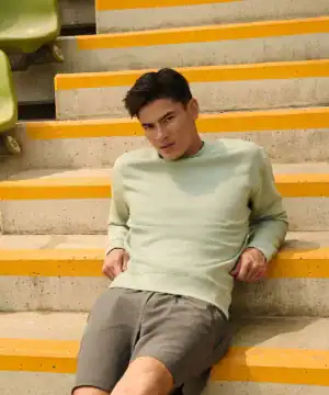 Men’s casual light green sweatshirt with set-in sleeves from CapeBali embroidery & printing.