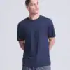 Man wearing a navy blue performance T-shirt for sports and activewear.