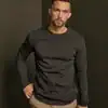 Men's black long sleeve interlock T-shirt for casual wear. Comfortable, durable, and perfect for eve.