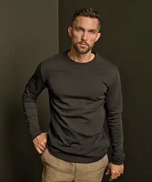 Men's black long sleeve interlock T-shirt for casual wear. Comfortable, durable, and perfect for eve.