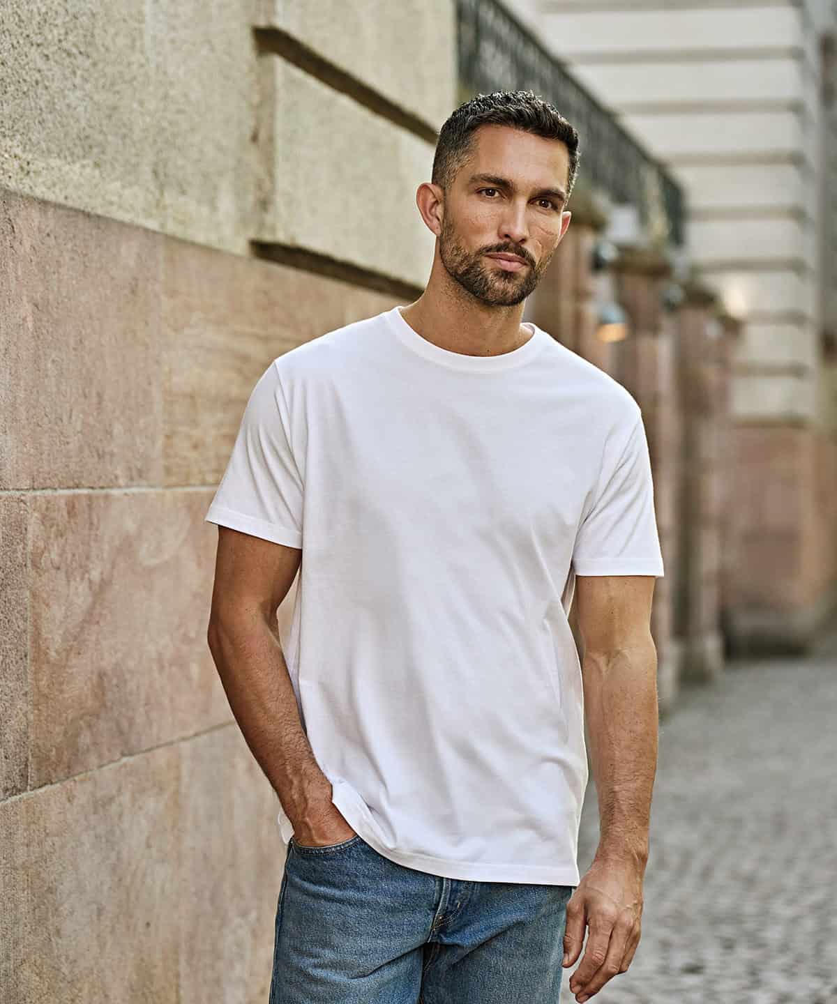 Plain white Sof tee with embroidery detail.