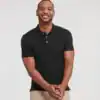 Man wearing a black stretch polo shirt, casual and comfortable fit.
