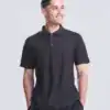 Man wearing a black performance polo shirt, ideal for sports and casual wear.