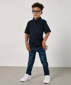 Child wearing Kids Klassic polo shirt, casual style, suitable for embroidery and printing.