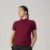 Women’s maroon pro polo shirt with collar, short sleeves, and comfortable fit.