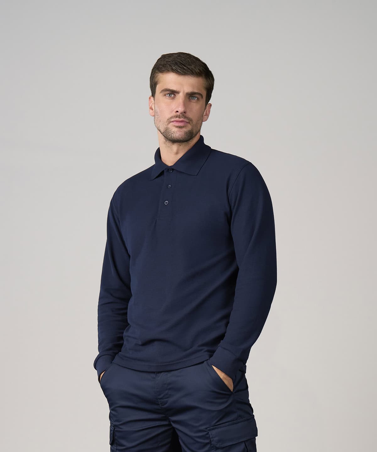 Elegant navy long sleeve polo shirt for men. Perfect for casual and professional wear with custom em.