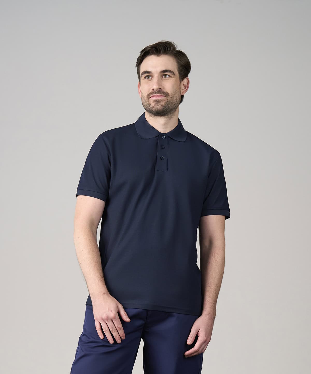 Quality navy blue pro wicking polo shirt for sports and casual wear.