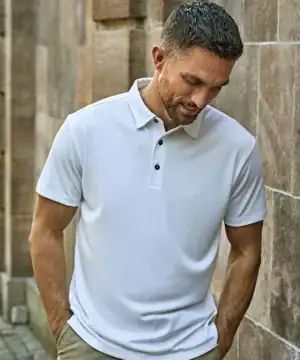 Embroidery and printing on high-quality polo shirts, perfect for sports teams and corporate branding.