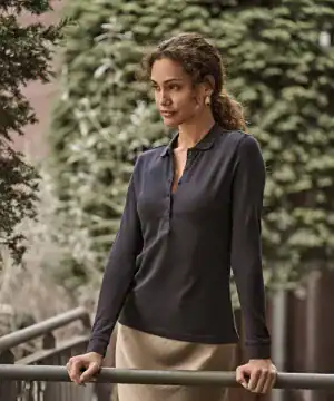 Elegant ladies long sleeve polo shirt with stretch fabric for comfort and style. Perfect for casual.