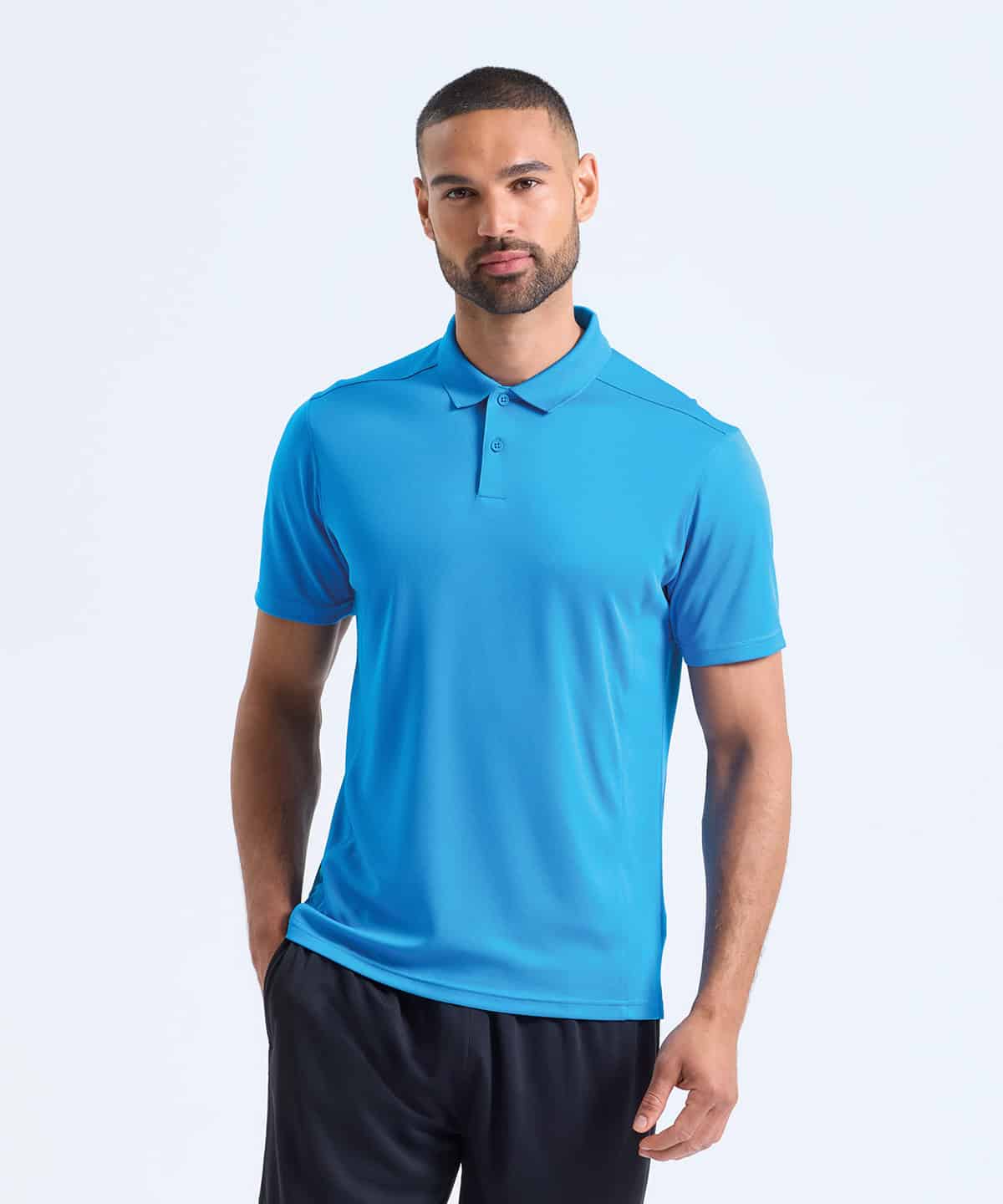 Blue TriDri panelled polo shirt ideal for sports and casual outfits.